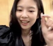 Jennie Kim doing the 'clock it' thing ...