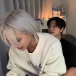 Seonghwa sitting on San’s lap.jpeg