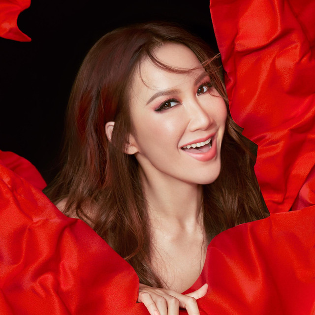 Coco Lee in red attire